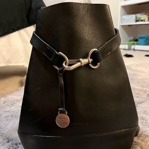 Dooney & Bourke handbag backpack style.